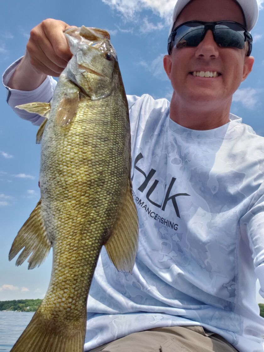 Mike Matuk with a Geneva Lake smallmouth bass. Provided photo