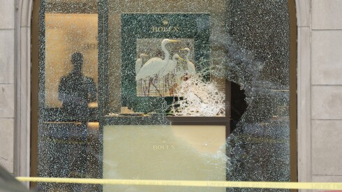 Smashed windows of a Rolex store on Michigan Avenue is seen after robbers broke windows and fled with luxury watches, Friday, Sept. 5, 2025. | Pat Nabong/Sun-Times