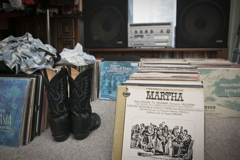 Perry Kanlan owned 4,300 vinyl records and more than 60 pairs of boots. He liked to buy them at Alcala’s Western Wear to match his outfits.