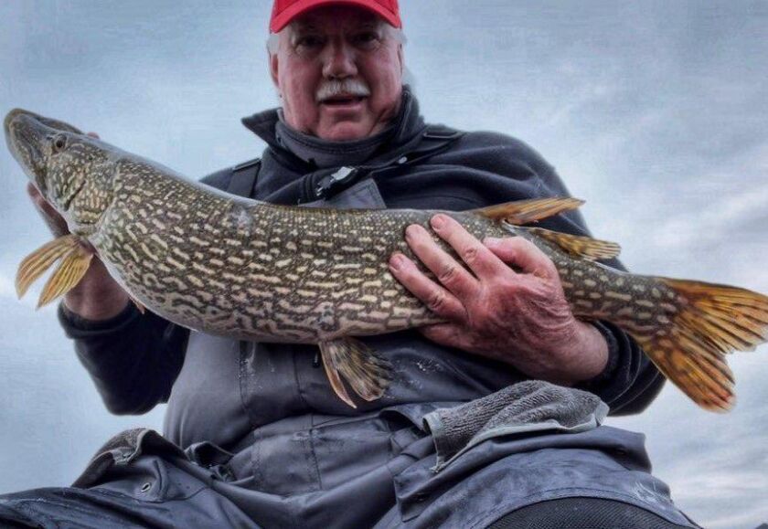 Mike Norris with a Green Lake northern pike. Provided photo