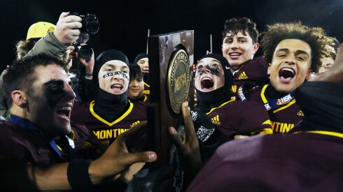Montini celebrates its Class 4A state championship win against Rochester.