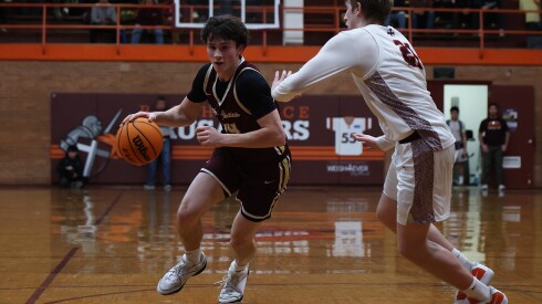 St. Ignatius's Chris Bolte (24) heads down the lane against Brother Rice.