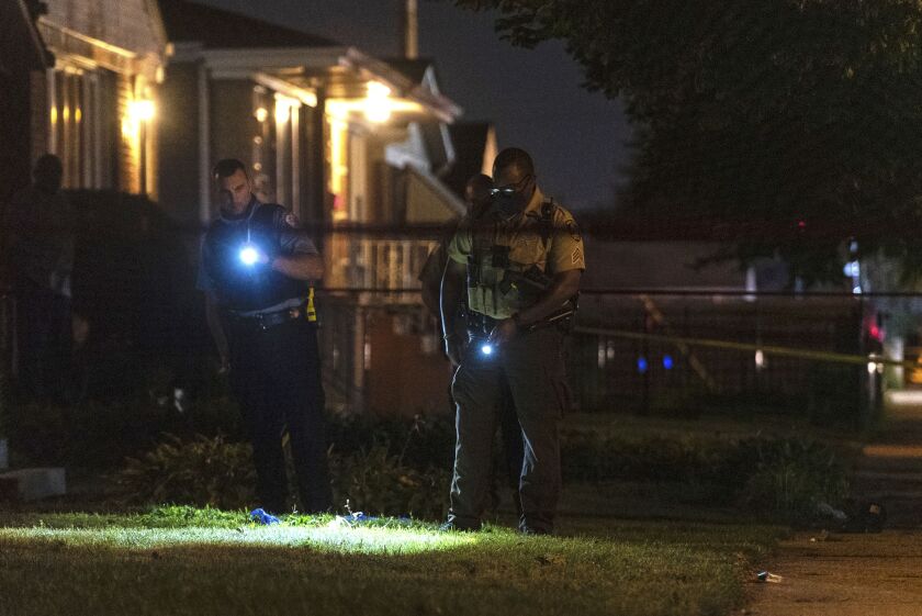 Chicago police and Cook County Sheriff’s officers investigate the scene where a Cook County Sheriff’s officer shot a person in the 4600 block of South Laramie in the LeClaire Courts neighborhood, Wednesday, Sept. 2, 2020.