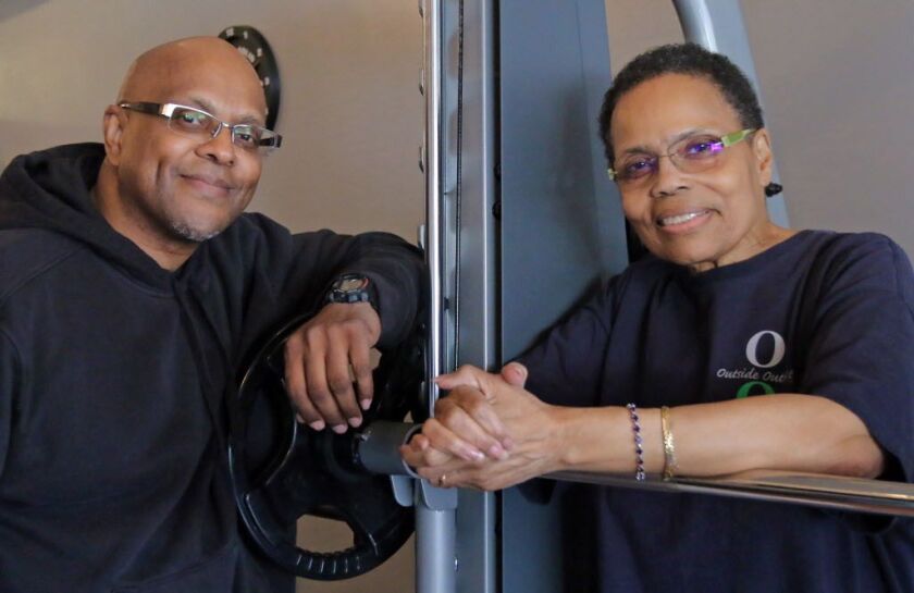 Trainer Maurice Durr and Lynda Powe pose for a photo during Powe’s workout session Thursday, March 23, 2017, in Forest Park, Illinois. | Tim Boyle/For Sun-Times Media