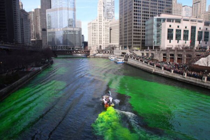 Workers dye the Chicago River green during the St. Patrick’s Day celebrations in Chicago Saturday, March 14, 2015. | Tim Boyle/For Sun-Times
