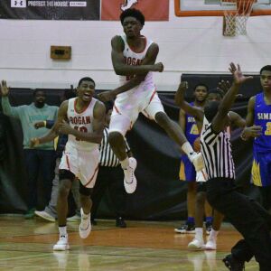 Bogan’s Tremeary Fraley (34) hits what he thought was the winning basket. Worsom Robinson/For the Sun-Times.