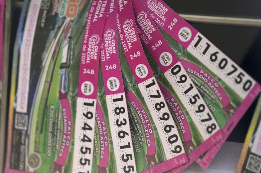 Lottery tickets for sale are displayed in Mexico City. Mexico’s lottery is giving away property seized from drug lords a prizes, among them a house belonging to Joaquín “El Chapo” Guzmán Loera in Wednesday’s draw.