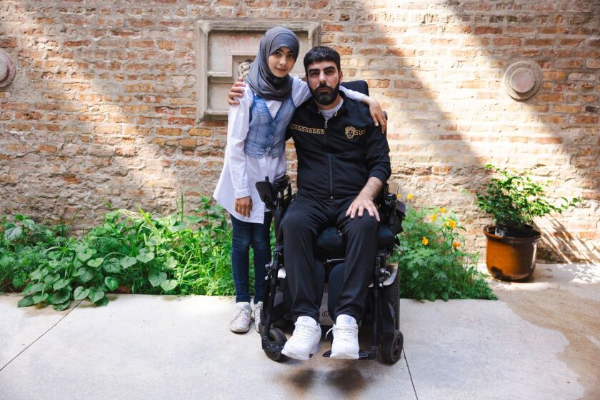 Sidra, 11, and her father Mohammad Zaazaa.