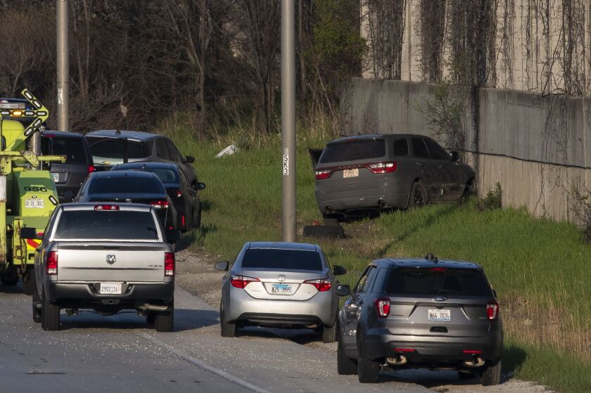 Chicago police and Illinois State Police investigate after a suspect was shot by an officer Thursday on inbound Interstate 290 near Mannheim Road.