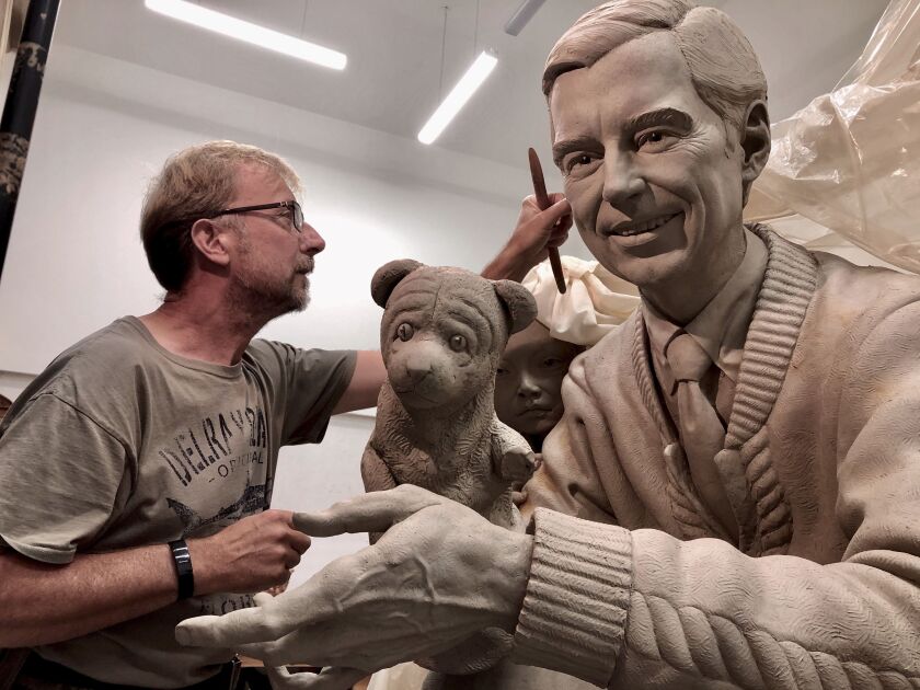 British artist Paul Day, known for his public monuments, works on a sculpture of Fred McFeely Rogers, better known as Mister Rogers, in a foundry in the Czech Republic.