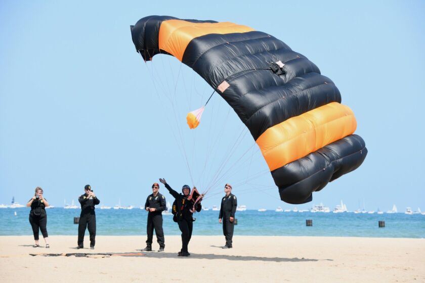 U.S. Army Golden Knights Parachute team member lands on North Avenue beach at the Air and Water Show in 2018.