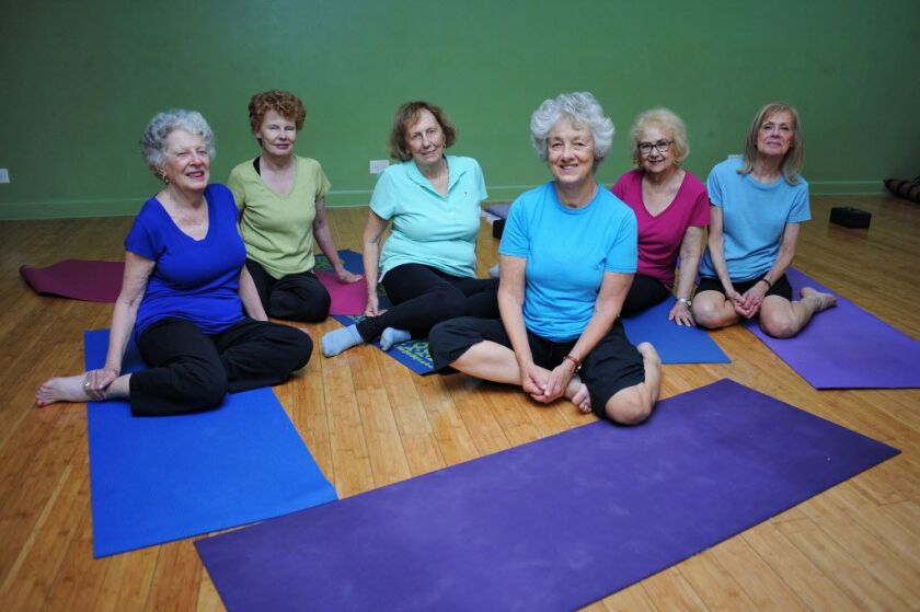 Instructor Sharon Steffensen (middle) and participants of “Grandma Yoga” class for seniors at the Chicago School of Yoga, 2442 N. Lincoln Ave. Monday, Aug. 6, 2018. | Victor Hilitski/For the Sun-Times