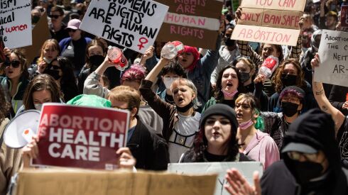 Pro-abortion rights activists chant as they march during a pro-abortion rights rally in the Loop, Saturday afternoon, May 7, 2022.