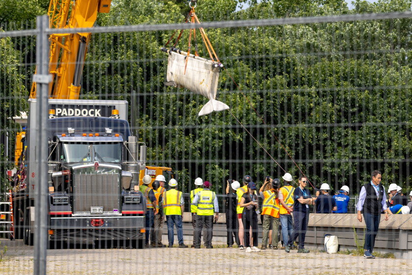 Beluga whale "Sierra" is transported by a group of experts from Marineland and several U.S. aquariums onto a truck at Marineland in Niagara Falls, Ontario, on Monday, July 20, 2026.