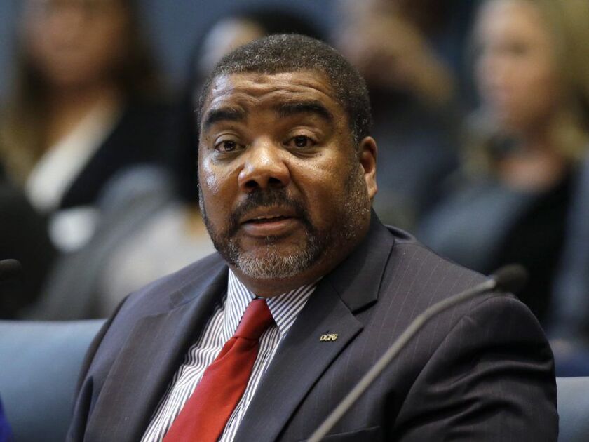 Department of Children and Family Services director Marc D. Smith testifies before the House Appropriations-Human Services Committee in April. (AP Photo/Kiichiro Sato)