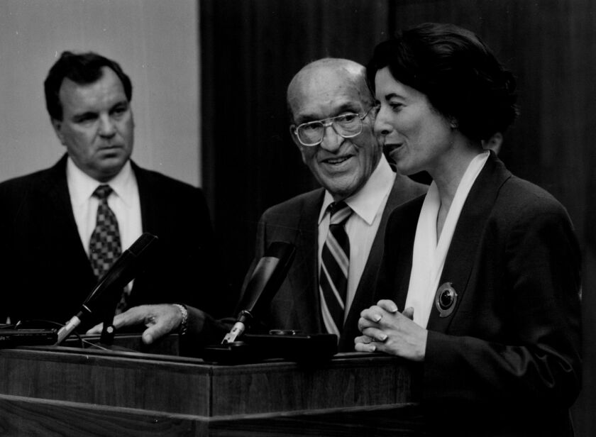 Mayor Richard M. Daley, left, announces the appointment of Margaret Laurino, right, to replace her retiring father, Ald. Anthony Laurino, center, in the 39th Ward in 1994.