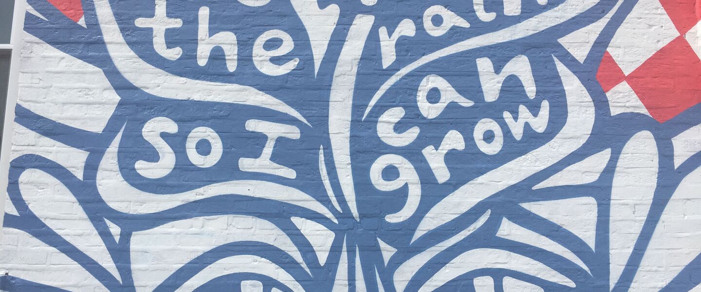 Artist ZorZorZor incorporated lyrics from Chicago singer-songwriter Jamila Woods into the mural at 18th Place and Throop Street.