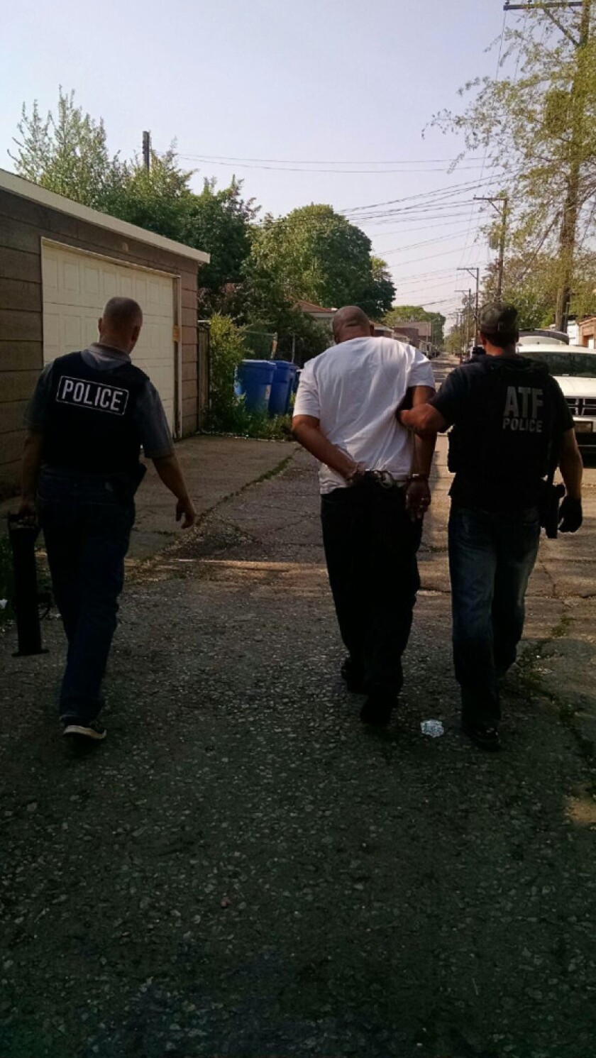 Eric Coachman was arrested on federal drug charges by ATF agents Monday morning on the South Side. | Aurora police
