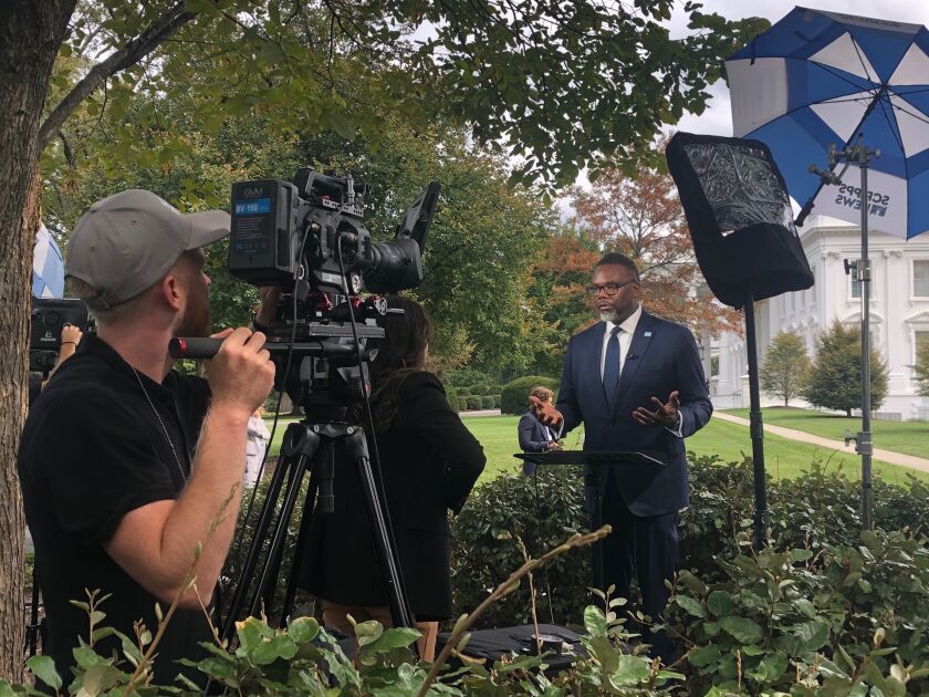 Chicago Mayor Brandon Johnson discusses gun violence in an interview outside the White House on Friday, Sept. 22, 2023.