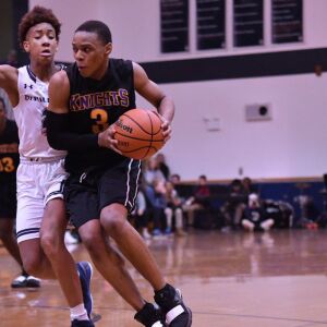 St. Mel’s Eric Jordan (3) blows past DePaul Prep’s Tyler Johnson (2). Worsom Robinson/For the Sun-Times.