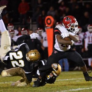 Yorkville’s Toran Harris (23) gets loose. Worsom Robinson/For the Sun-Times.
