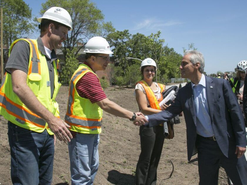 Mayor Rahm Emanuel greeted construction workers as he took a tour of The 606 Trail, which opened in 2015. | Ashlee Rezin/Sun-Times