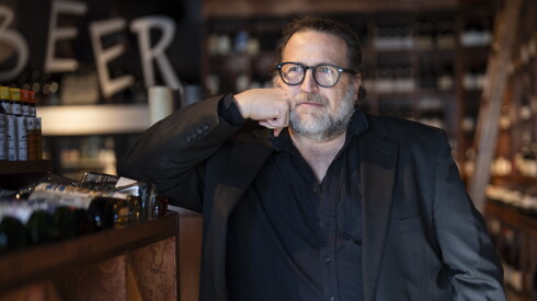 Portrait of Lush Wine & Spirits co-owner Mitch Einhorn inside his wine bar and cafe