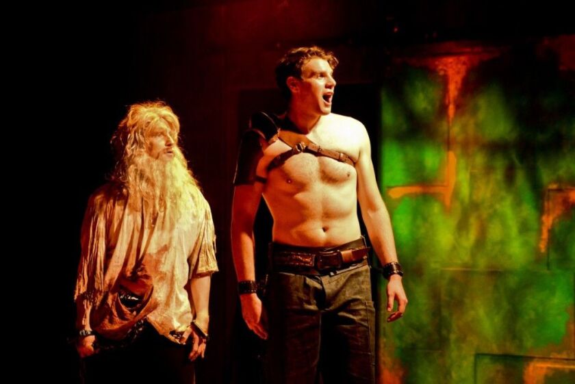 Geoff Button (left) is Prometheus and Walter Briggs is Herakles in The Hypocrites’ production of “All Our Tragic.” (Photo: Evan Hanover)