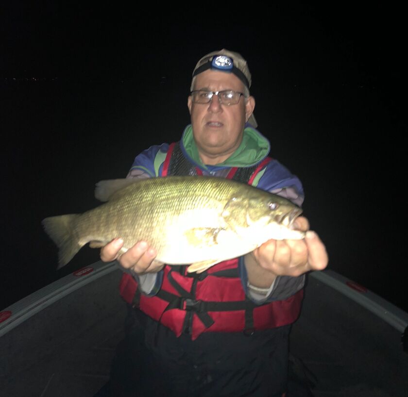 Arden Katz with one of his best smallmouth of the year, night fishing Geneva Lake. Photo provided by Roger Jackson