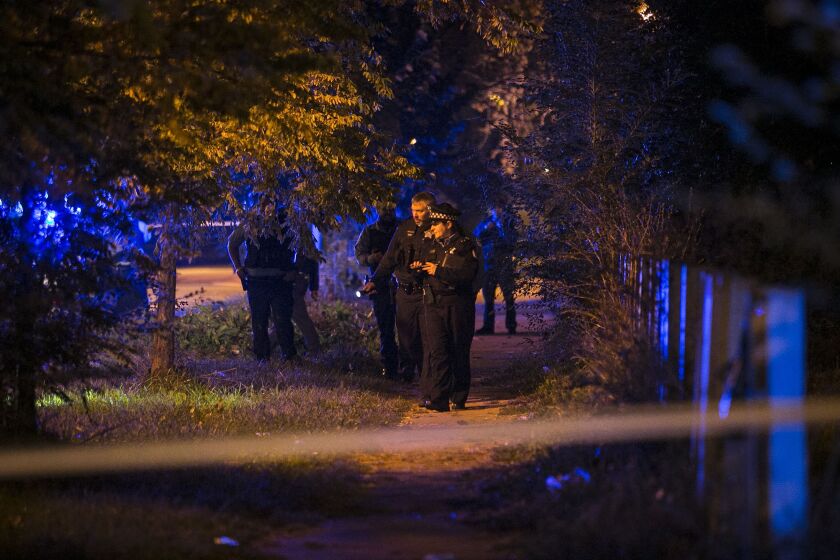 Chicago Police investigate in the 1500 block of South Christiana, where a 20-year-old man was shot to death early Sunday, Oct. 23, 2016. | Ashlee Rezin/Sun-Times
