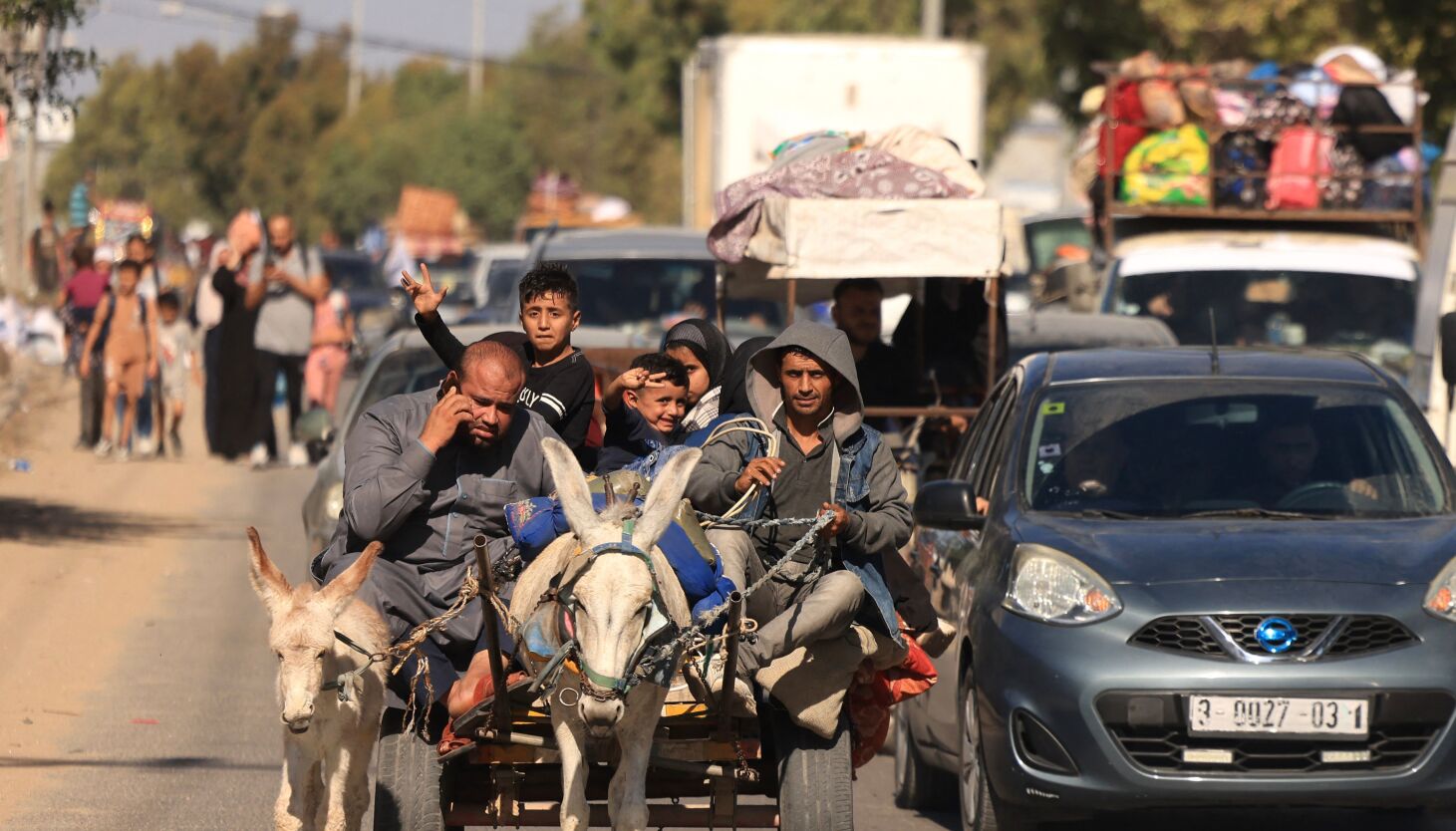 NextImg:Palestinians flee northern Gaza after Israel orders 1 million to evacuate as ground attack looms