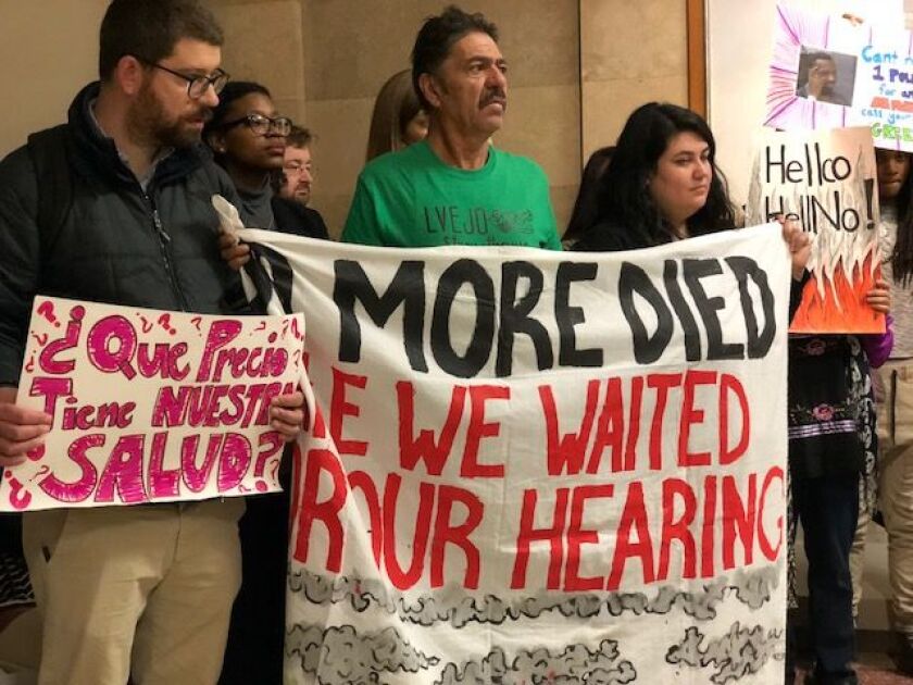 Little Village residents and their supporters, upset about how a former coal-fired powerplant site will be redeveloped, held a news conference Thursday at City Hall. | Fran Spielman/Sun-Times