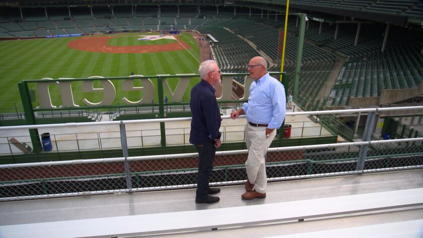 Maddon speaks with Smith at Wrigley Field. | NBC News