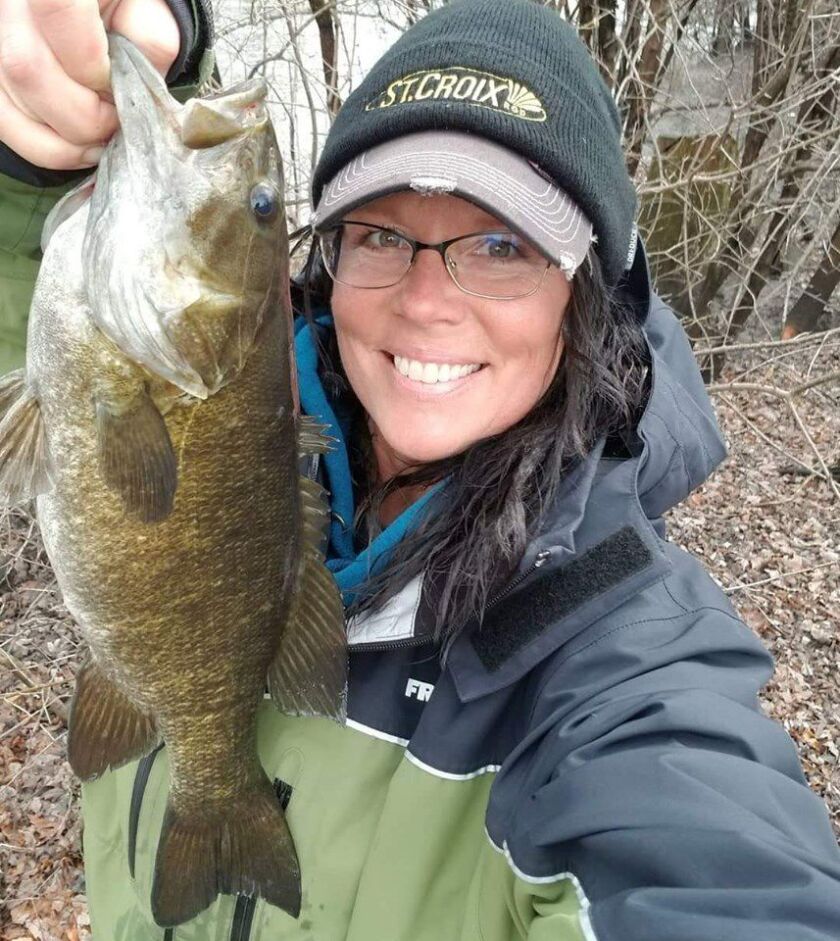 Cheryl Smith with a smallmouth bass from the Fox River. Provided photo