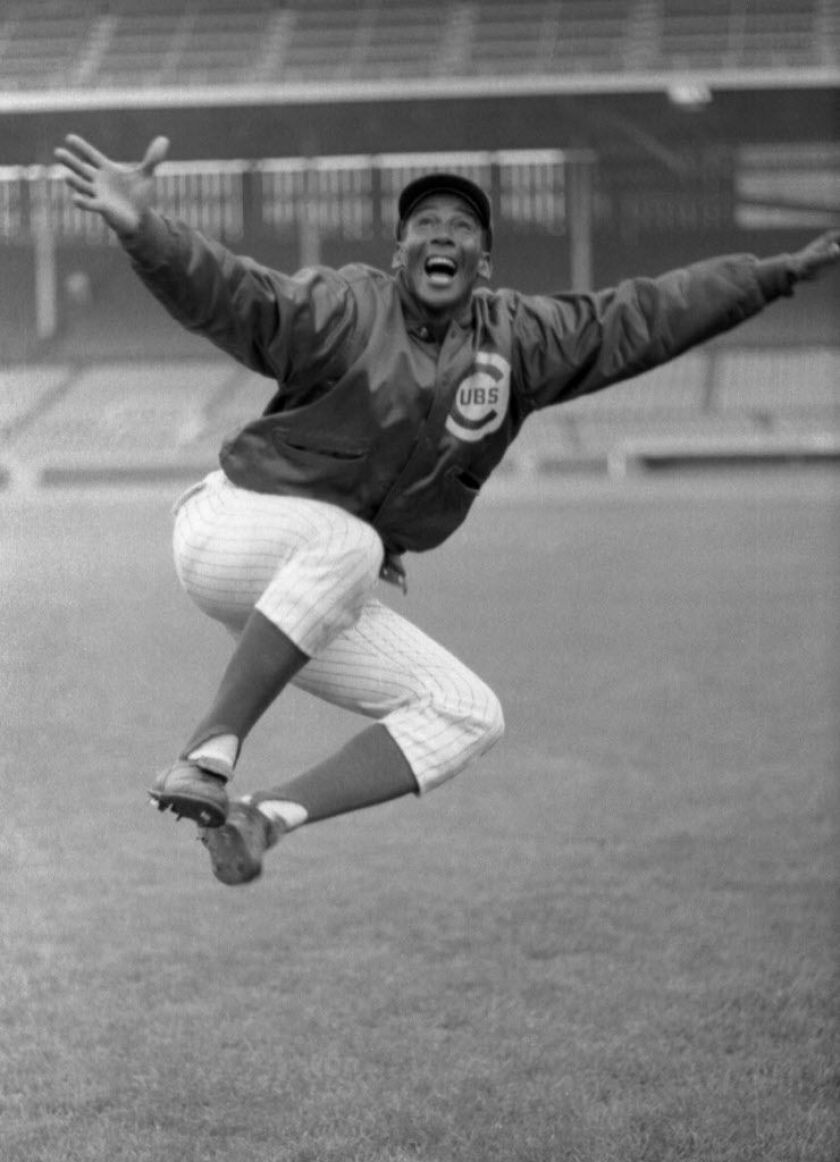 Ernie Banks clicks his heels in 1970 after hitting his 500th home run. | Sun-Times Media