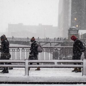 Morning commuters cross the Chicago River on Adams St. Monday morning. | Rich Hein/Sun-Times