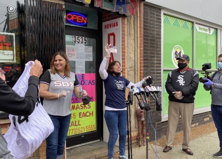 Novias Davilas shop workers, including manager Patty Navarro, was surprised with gift cards and cash from White Sox outfielder Eloy Jimenez Friday.