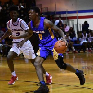 Simeon’s Kejuan Clements (0) brings the ball down court. Worsom Robinson/For the Sun-Times.