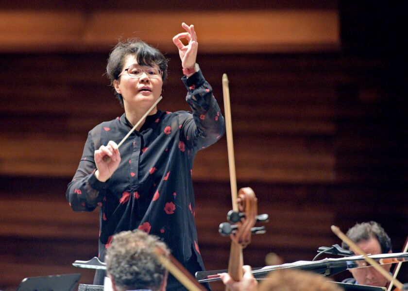 Conductor Mei-Ann Chen leads the Chicago Sinfonietta through a contemporary piece during rehearsals on Wednesday, September 13, 2017, in Naperville, Illinois. (Jon Langham/for the Sun-Times)