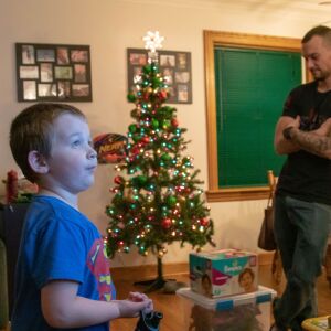 Liam Miller (L) and his father, Lorin Miller (R) in their Oriole Park home. | Brian Ernst/Sun-Times
