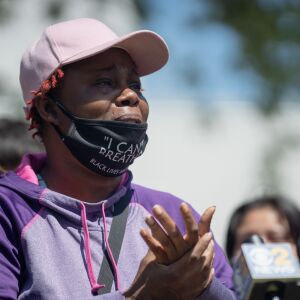 Sabrina Pleasant, the mother of Caleb Reed, an activist who was fatally shot in West Rogers Park Friday July 31, 2020, speaks during a press conference outside Mather High School Tuesday afternoon August 4, 2020. The 17-year-old youth activist advocated for the removal of police in Chicago Public Schools.