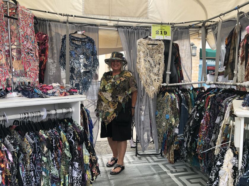 Wearable art artist Sue Lances at the Port Clinton Art Festival in Highland Park, nearly two months after the July 4 parade massacre.
