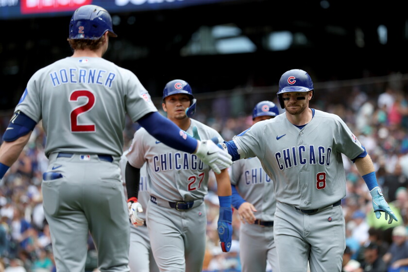 In blowout win, ian happ, pedro ramirez become third cubs duo to hit grand slams in same game 2026 - юстиция Cubs left fielder ian happ celebrates his grand slam during a game against the mariners on aug. 23.