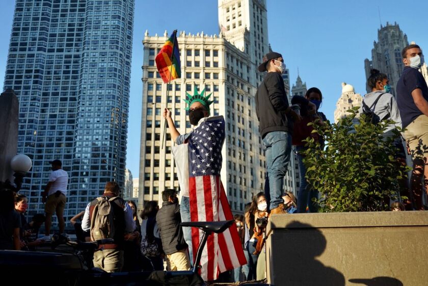 Chicagoans celebrate Joe Biden’s White House win on Saturday.