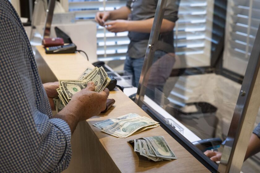 Sales like this one in May at Cresco Labs’ dispensary at 436 N. Clark St. have made legal weed a booming business in Illinois. Dispensaries statewide have sold $580 million of recreational marijuana in the first 11 months since it was legalized.