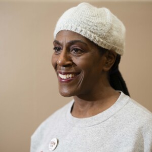 Kimberly Carlos wears a hat she knitted during the 19th YarnCon at the Plumbers Union Hall in the Near West Side on Saturday.