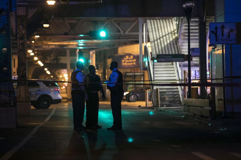 Chicago Police investigate in the 4000 block of West Lake Street, where one man was killed and another was wounded in a shooting early Wednesday, July 5, 2017. | Ashlee Rezin/Sun-Times