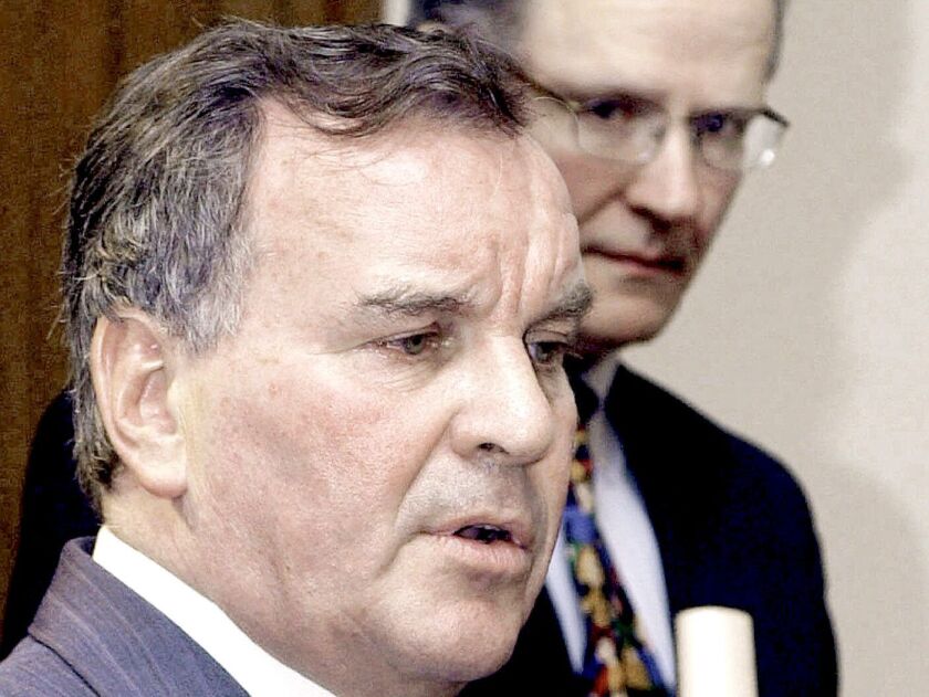 Paul Vallas had strong support in Chicago’s black community during his tenure as Schools CEO. He held the post from 195 to 2001; here Mayor Richard M. Daley accepts Vallas’ resignation from CPS in June 2001. | Associated Press
