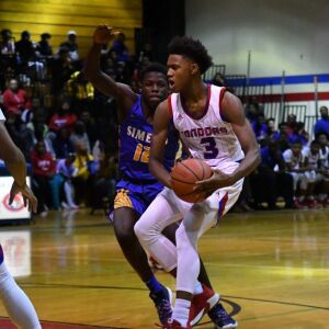 Curie’s DaJuan Gordon (3) (3) stops at the free throw line. Worsom Robinson/For the Sun-Times.