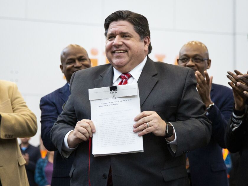 Gov. J.B. Pritzker signs Senate Bill 177, intended to bolster a diverse workforce on Rebuild Illinois capital projects.